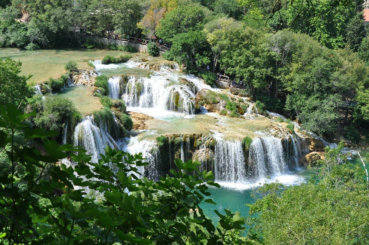 Stepped Krka waterfalls surrounded by greenery