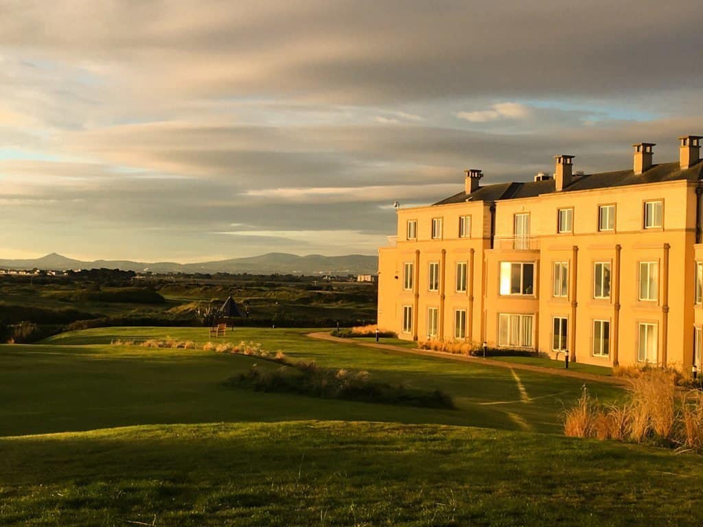 View of Portmarnock Hotel Dublin with the golf course and sand dunes in front