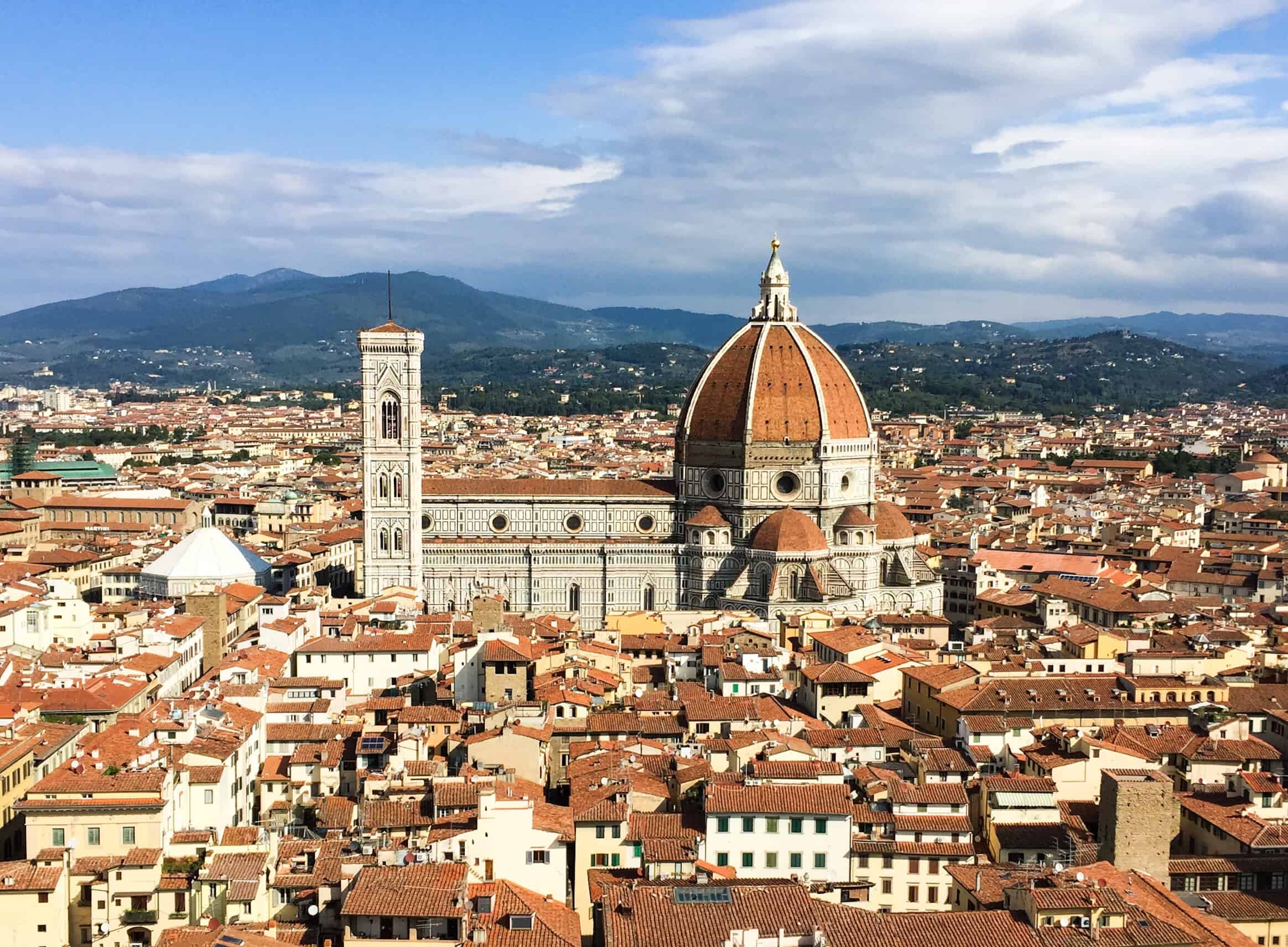 Aerial view of the red tile roofs and Duomo in Florence Italy