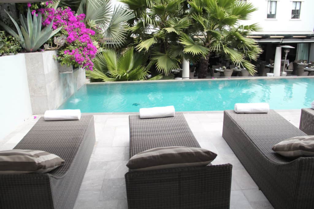 Loungers by a pool in San Miguel de Allende Spa